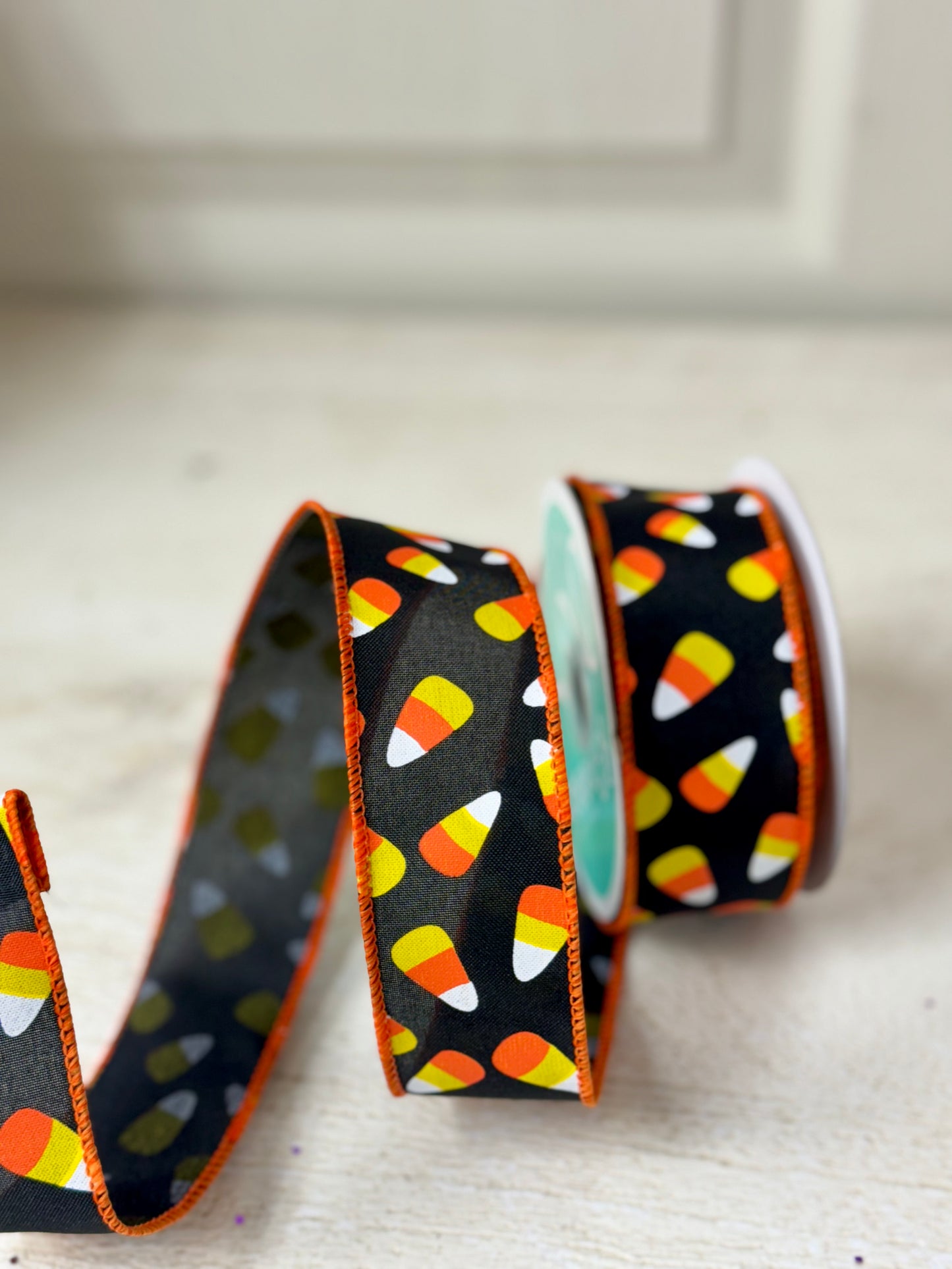 1.5 Inch By 10 Yard Black Background With Candy Corns Ribbon