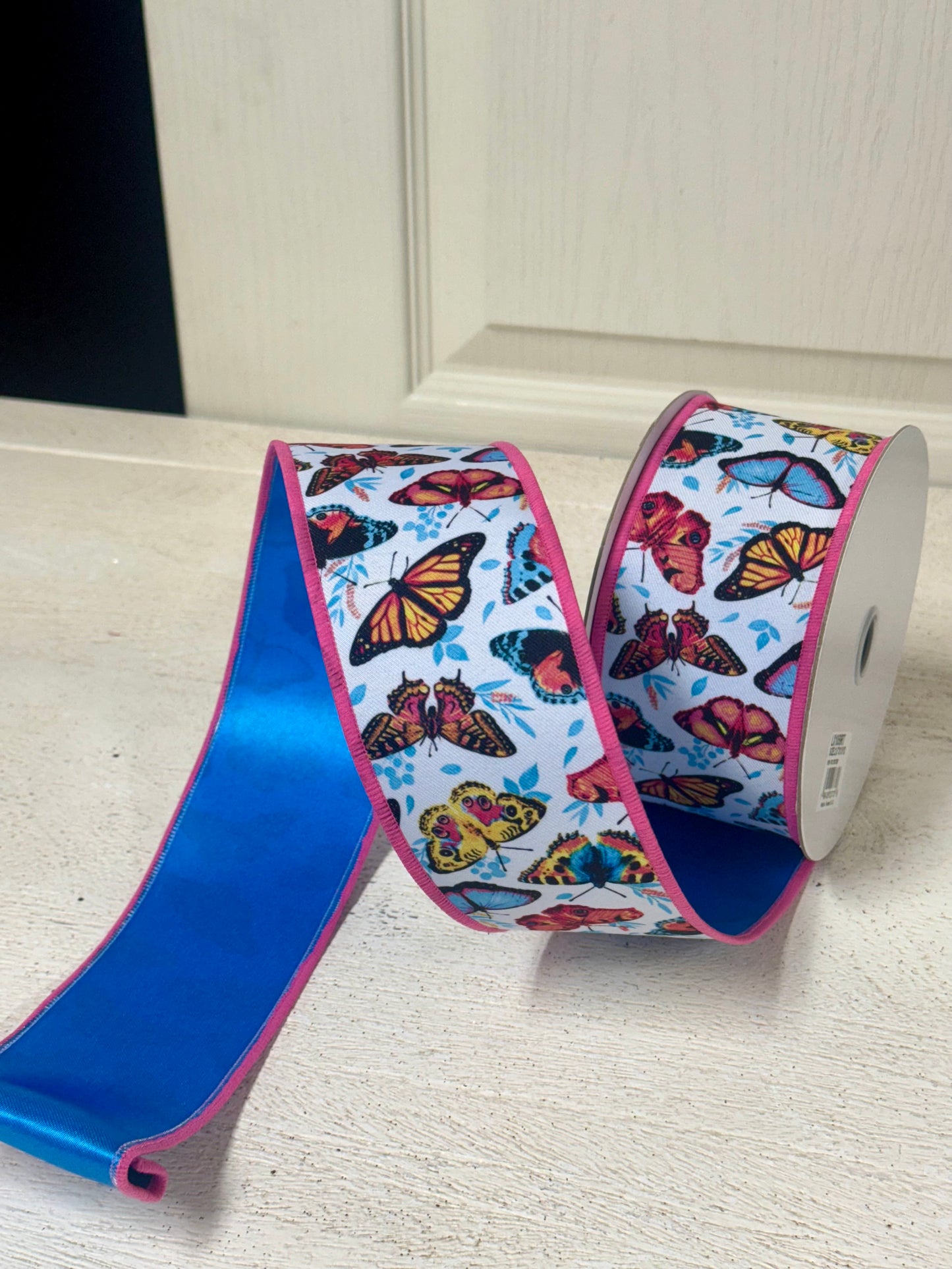 2.5 Inch By 10 Yard Multicolor Butterflies With Blue Backing Ribbon