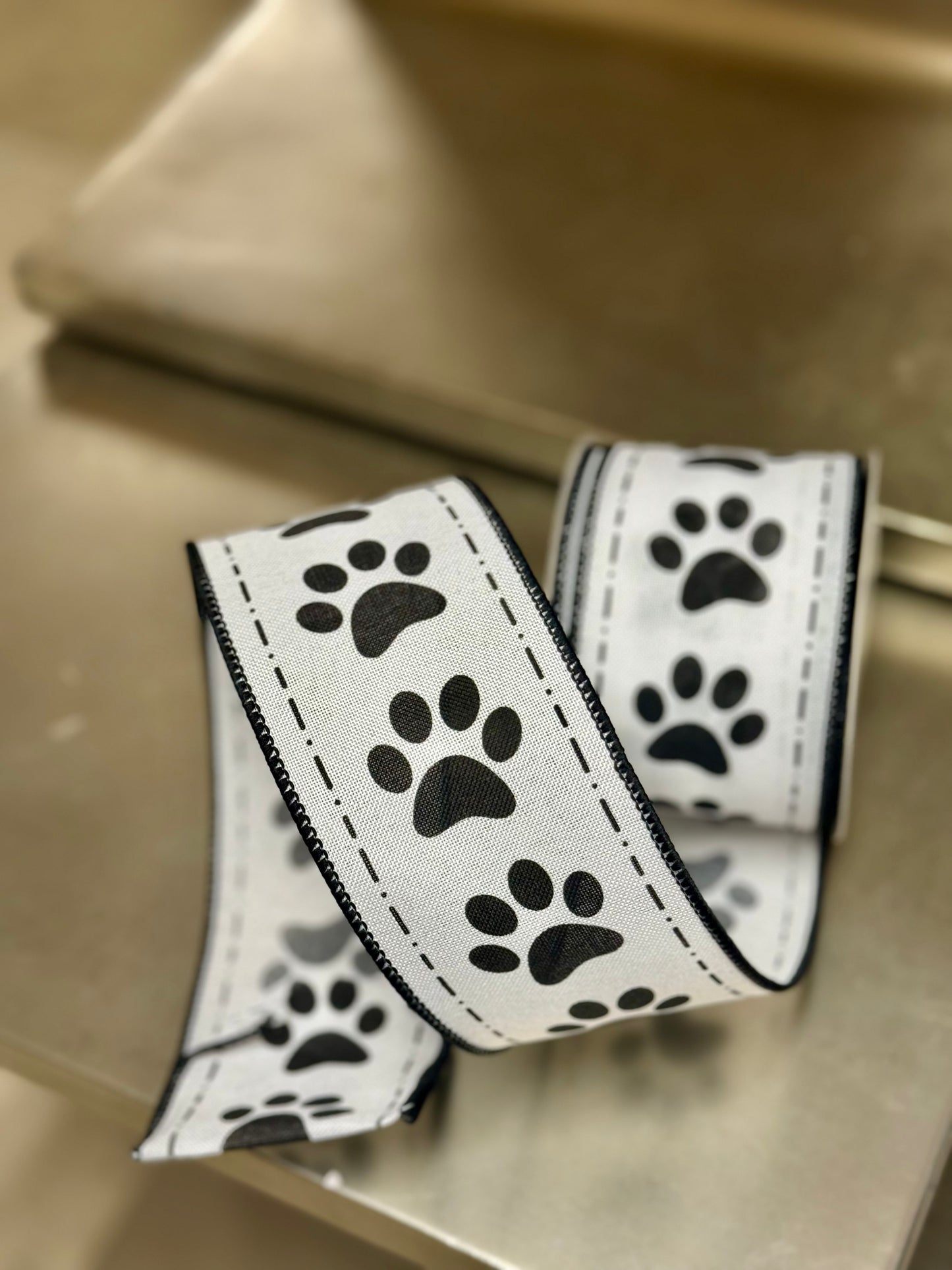 2.5 Inch By 10 Yard Black And White Paw Prints Ribbon