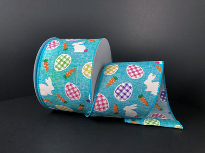 2.5 Inch By 10 Yard Blue With Easter Bunny Easter Egg And Carrots Ribbon