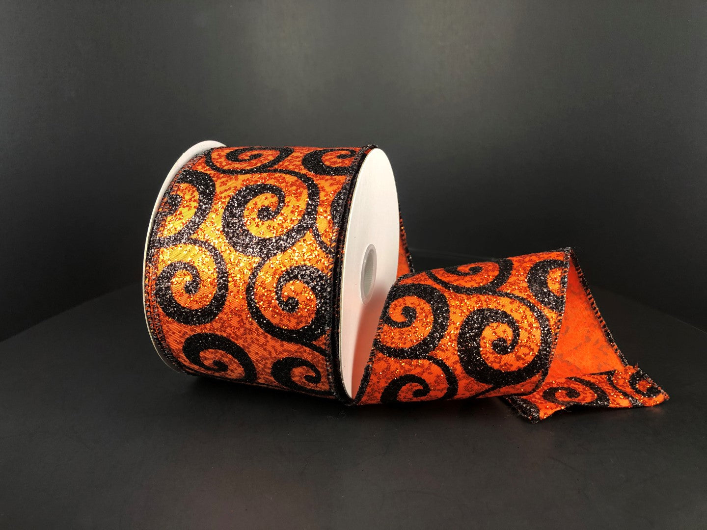 2.5 Inch By 10 Yard Orange With Black Glitter Swirls Ribbon