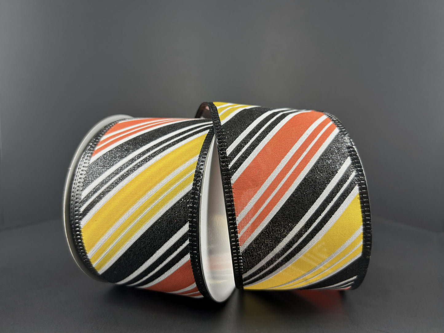 2.5 Inch By 10 Yard Orange Black And Yellow Diagonal Striped Ribbon