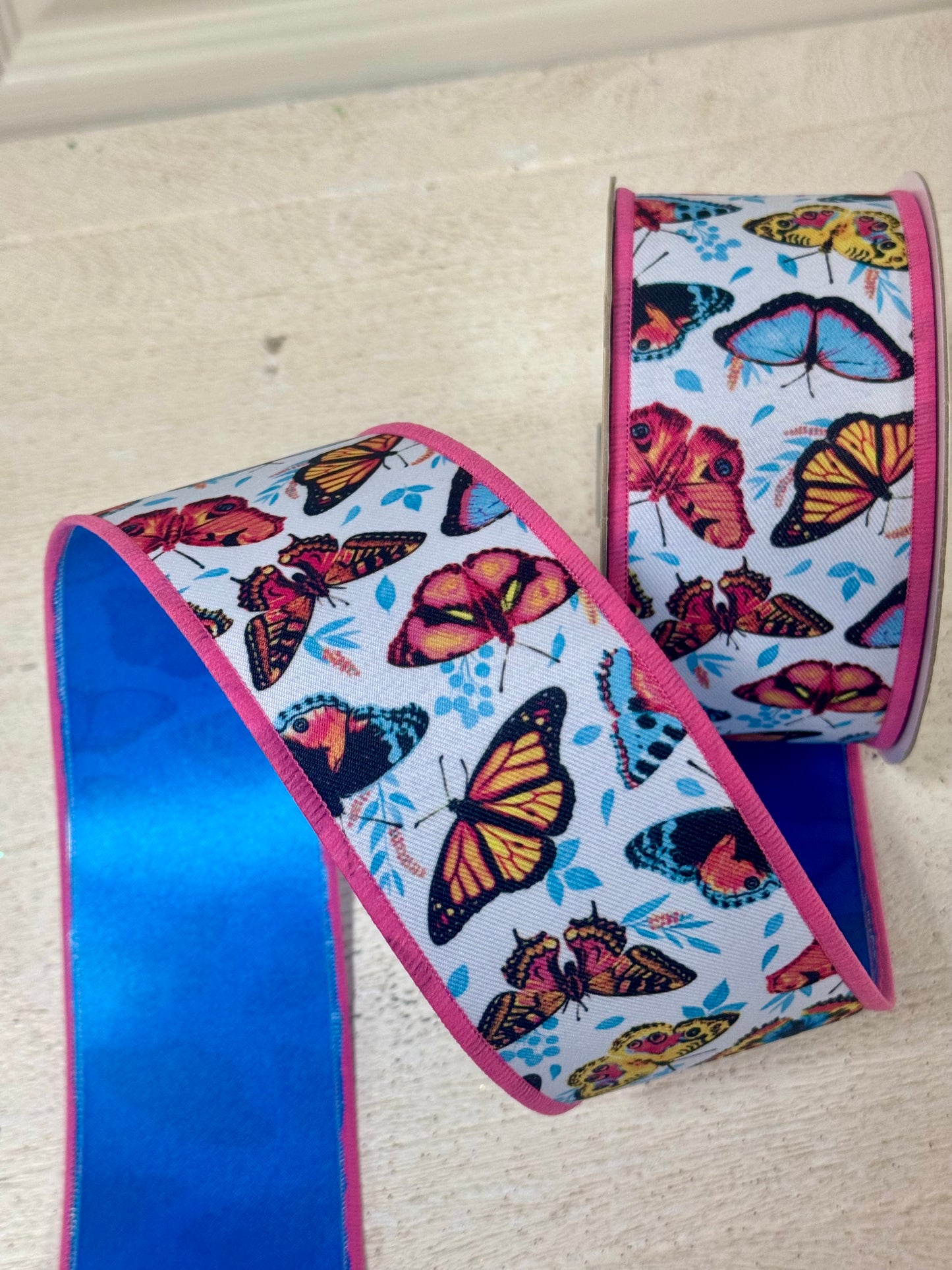 2.5 Inch By 10 Yard Multicolor Butterflies With Blue Backing Ribbon