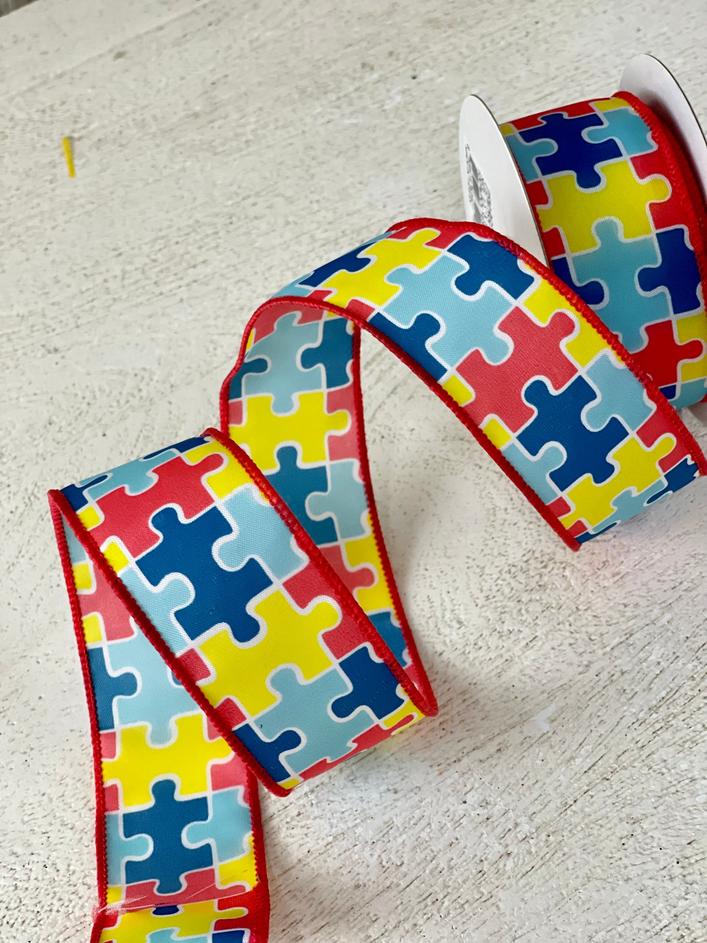 1.5 Inch By 10 Yard Puzzle Piece Ribbon