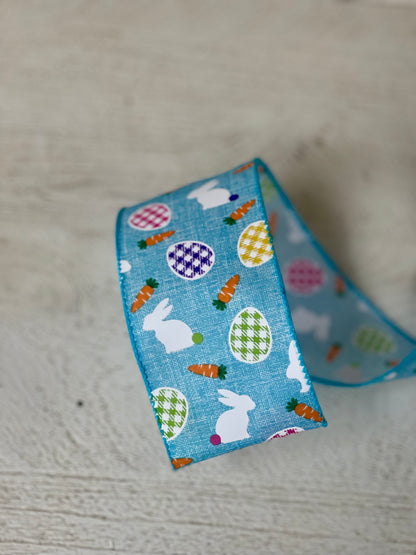 2.5 Inch By 10 Yard Blue With Easter Bunny Easter Egg And Carrots Ribbon