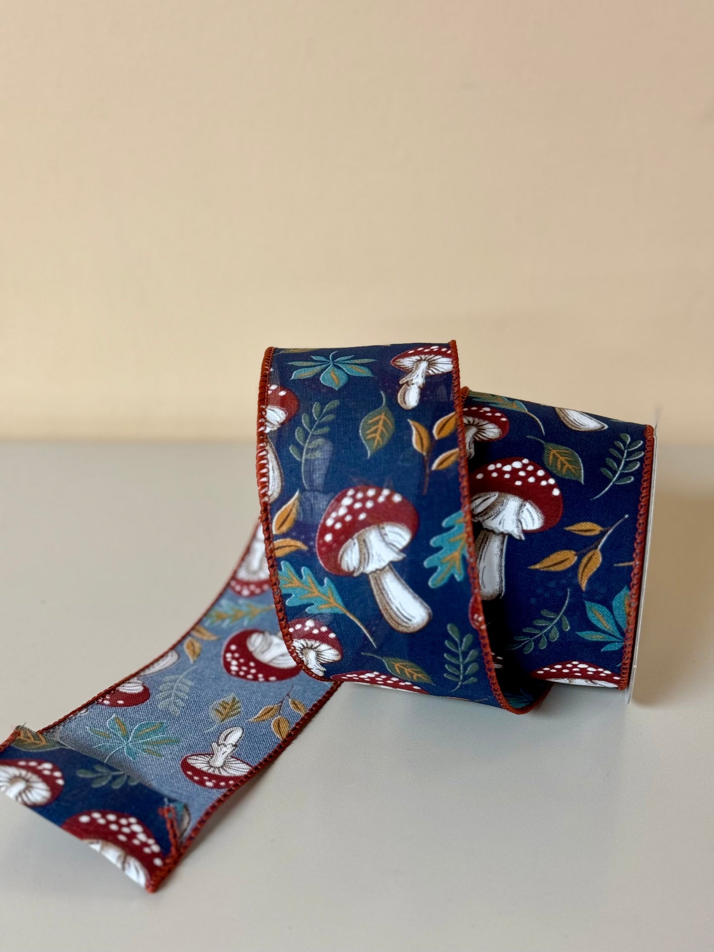 2.5 Inch By 10 Yard Navy With Mushrooms And Leaves Ribbon