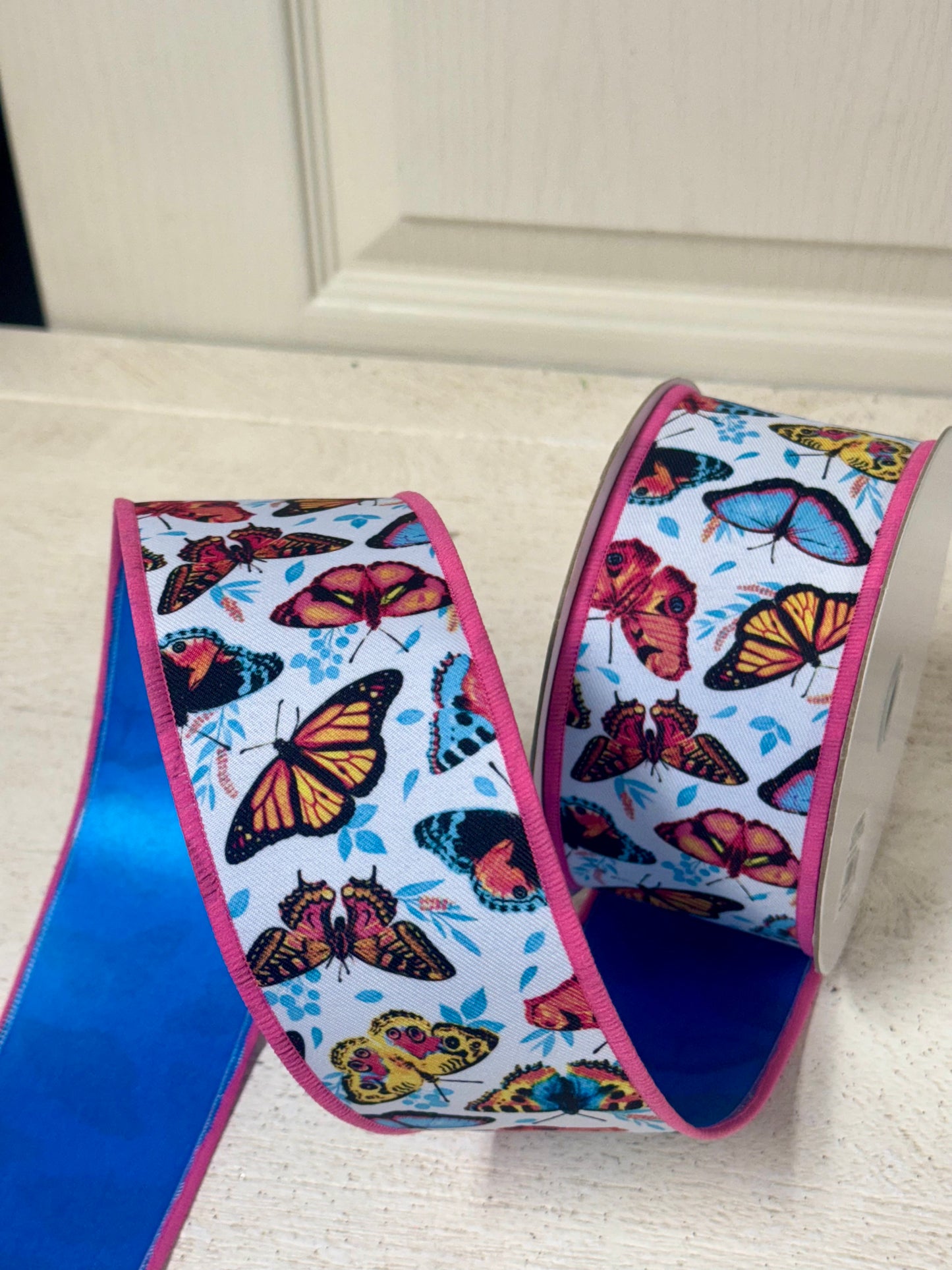 2.5 Inch By 10 Yard Multicolor Butterflies With Blue Backing Ribbon