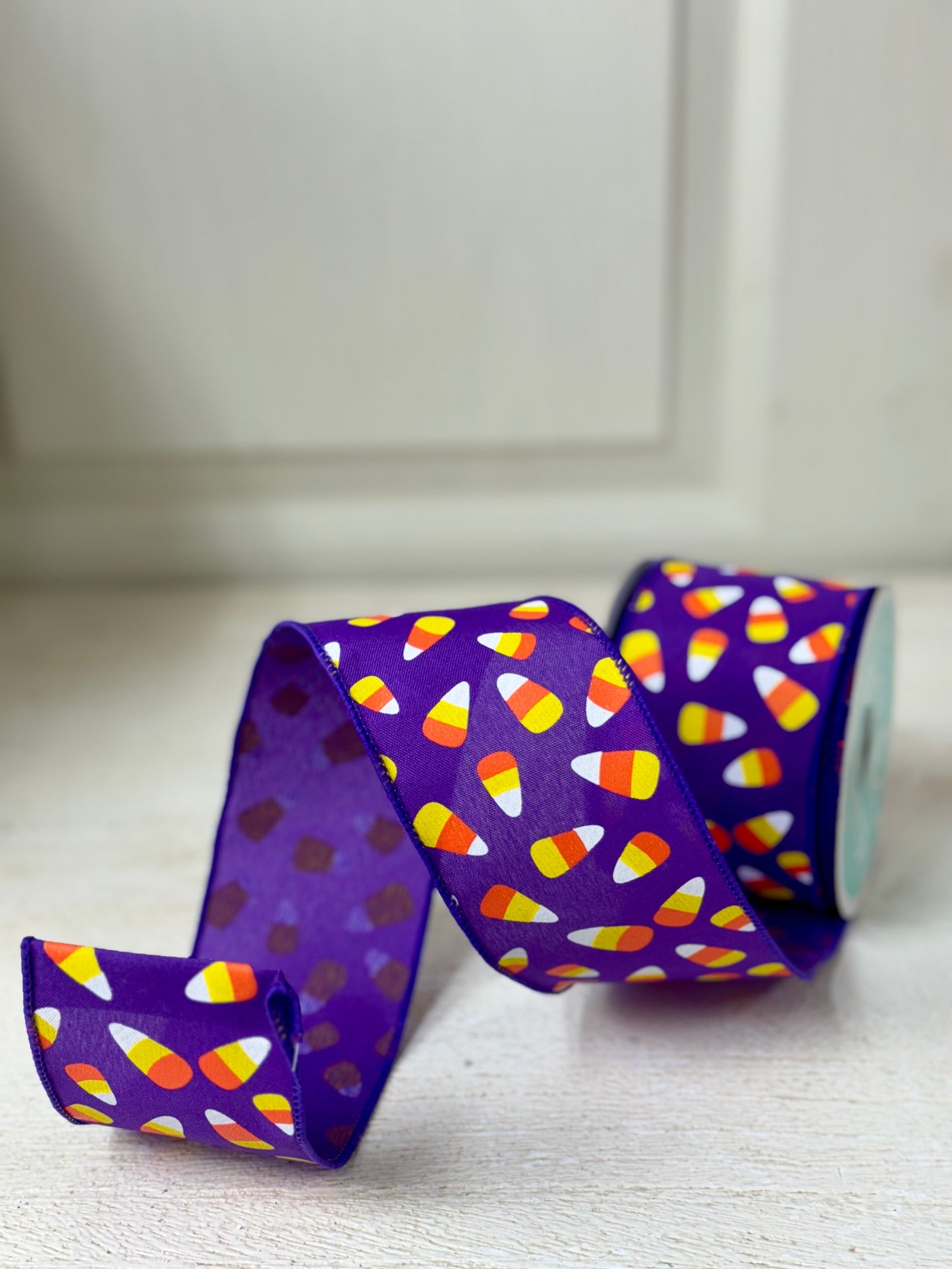 2.5 Inch By 10 Yard Purple Background With Candy Corn Ribbon