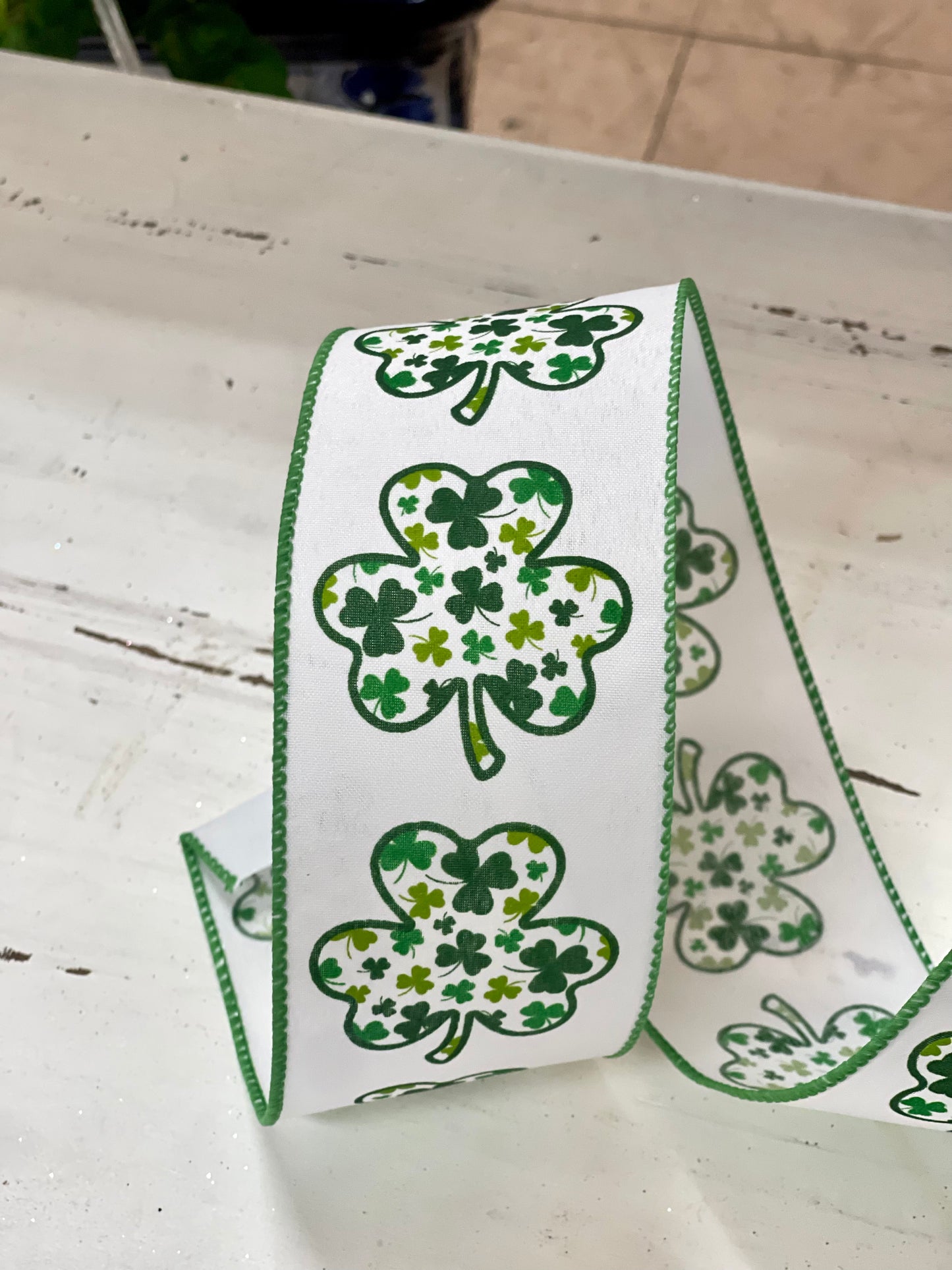 2.5 Inch By 10 Yard White Background With Green Clovers Ribbon