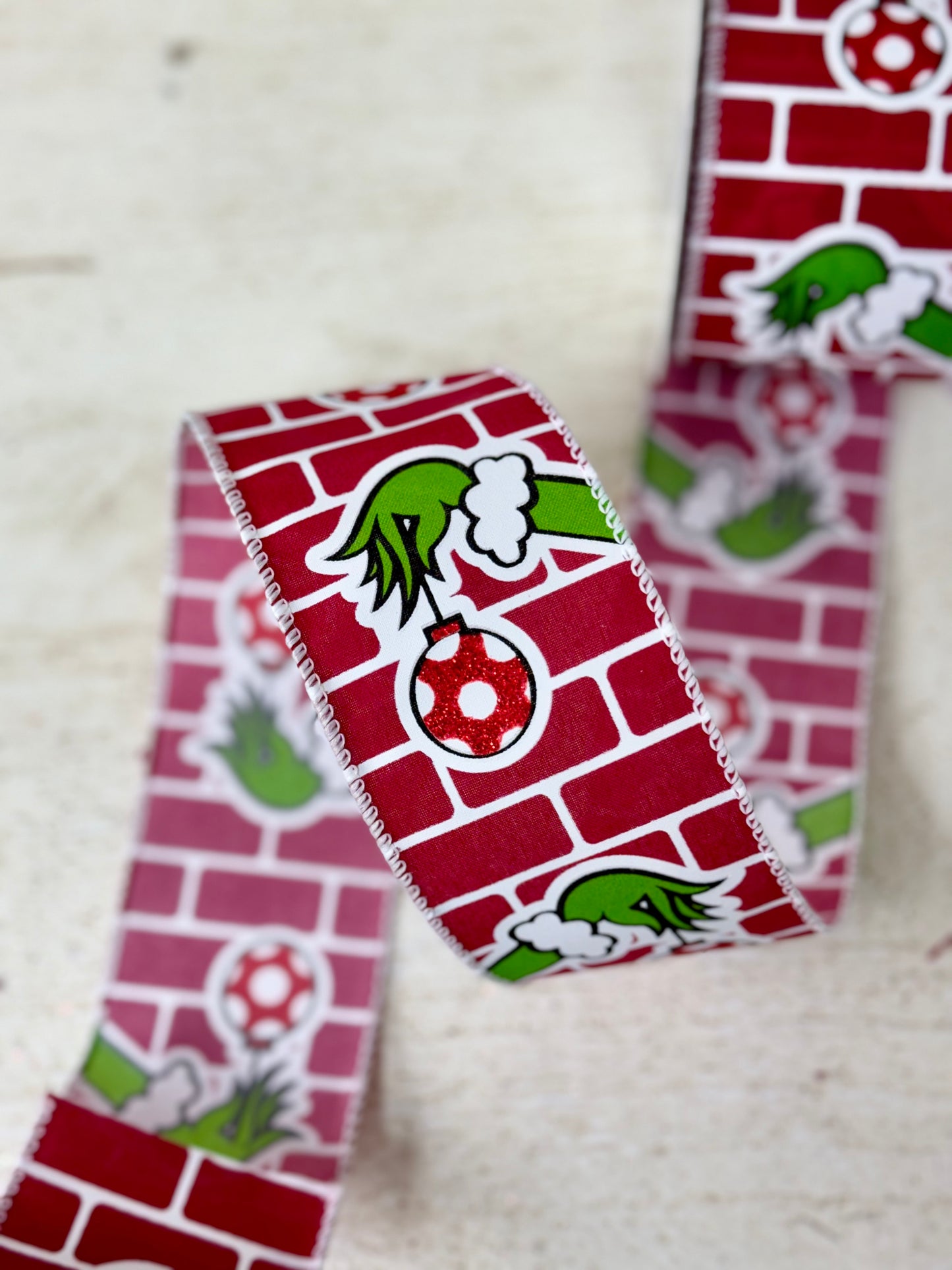 2.5 Inch By 10 Yard Monster Hand Holding Ornament Ribbon