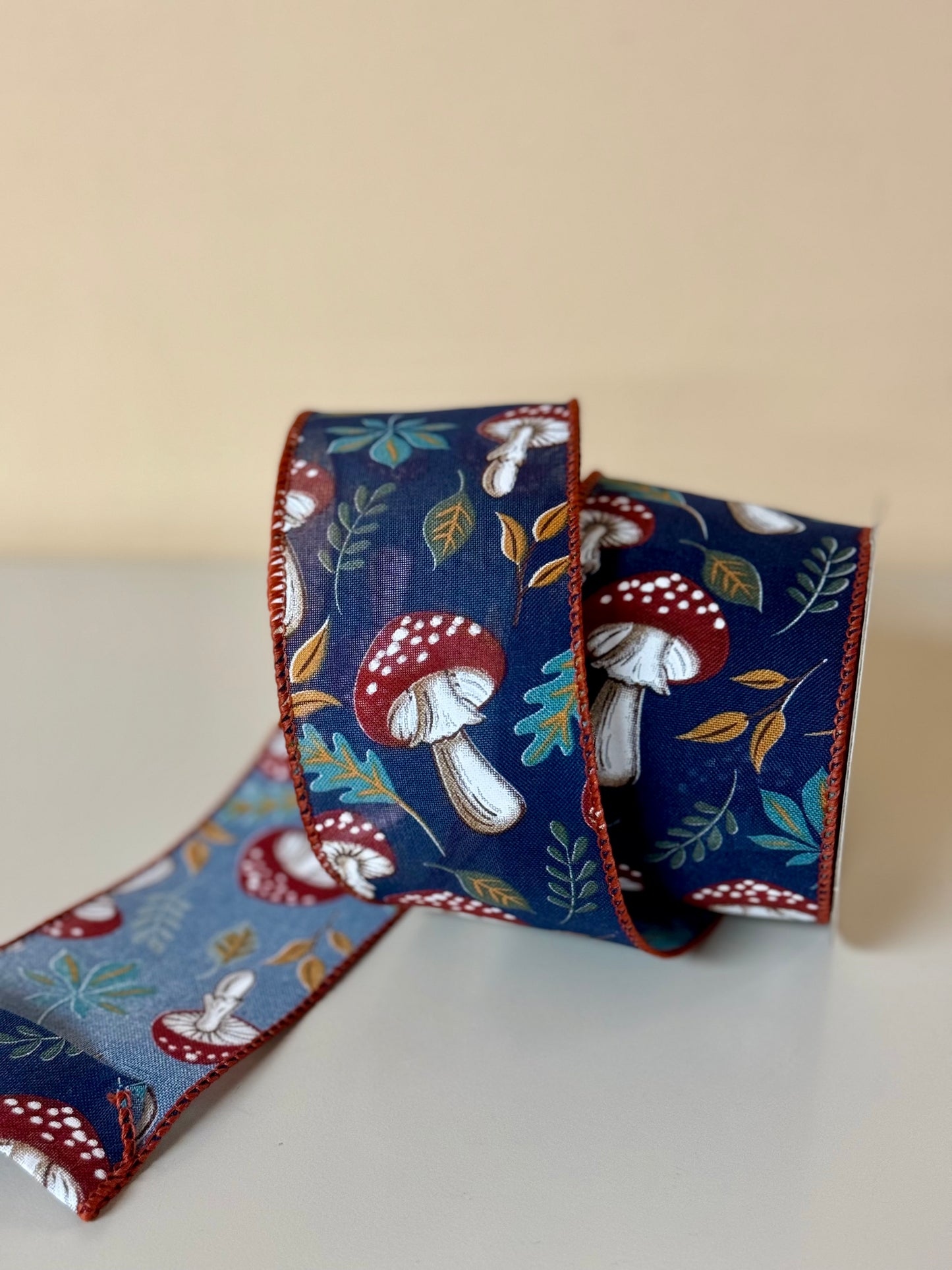 2.5 Inch By 10 Yard Navy With Mushrooms And Leaves Ribbon