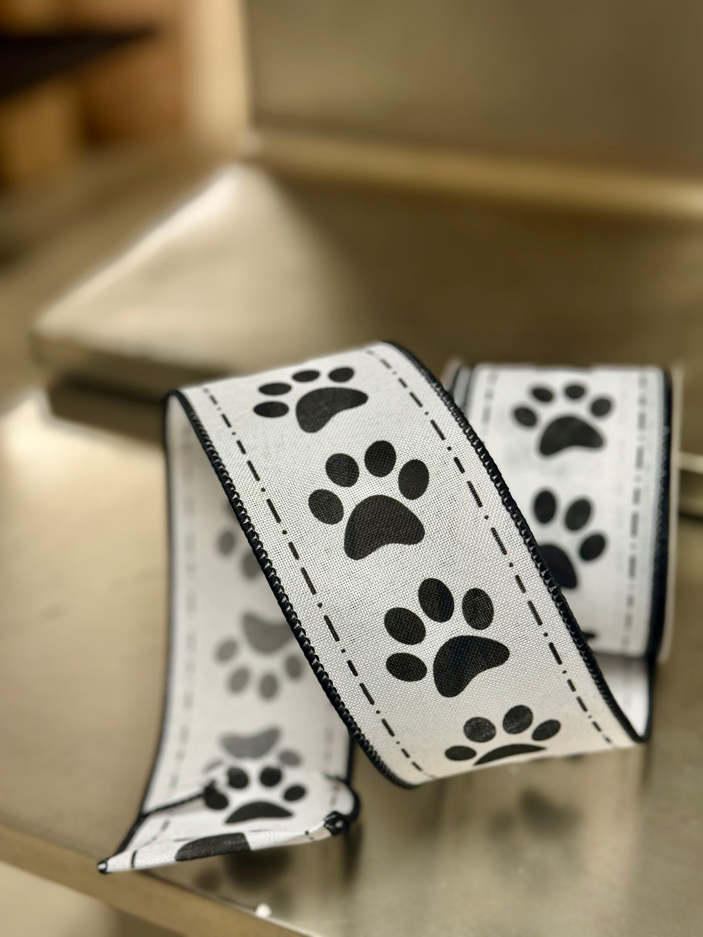 2.5 Inch By 10 Yard Black And White Paw Prints Ribbon