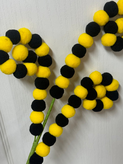 27 Inch Black And Yellow Pom Pom Coil Spray