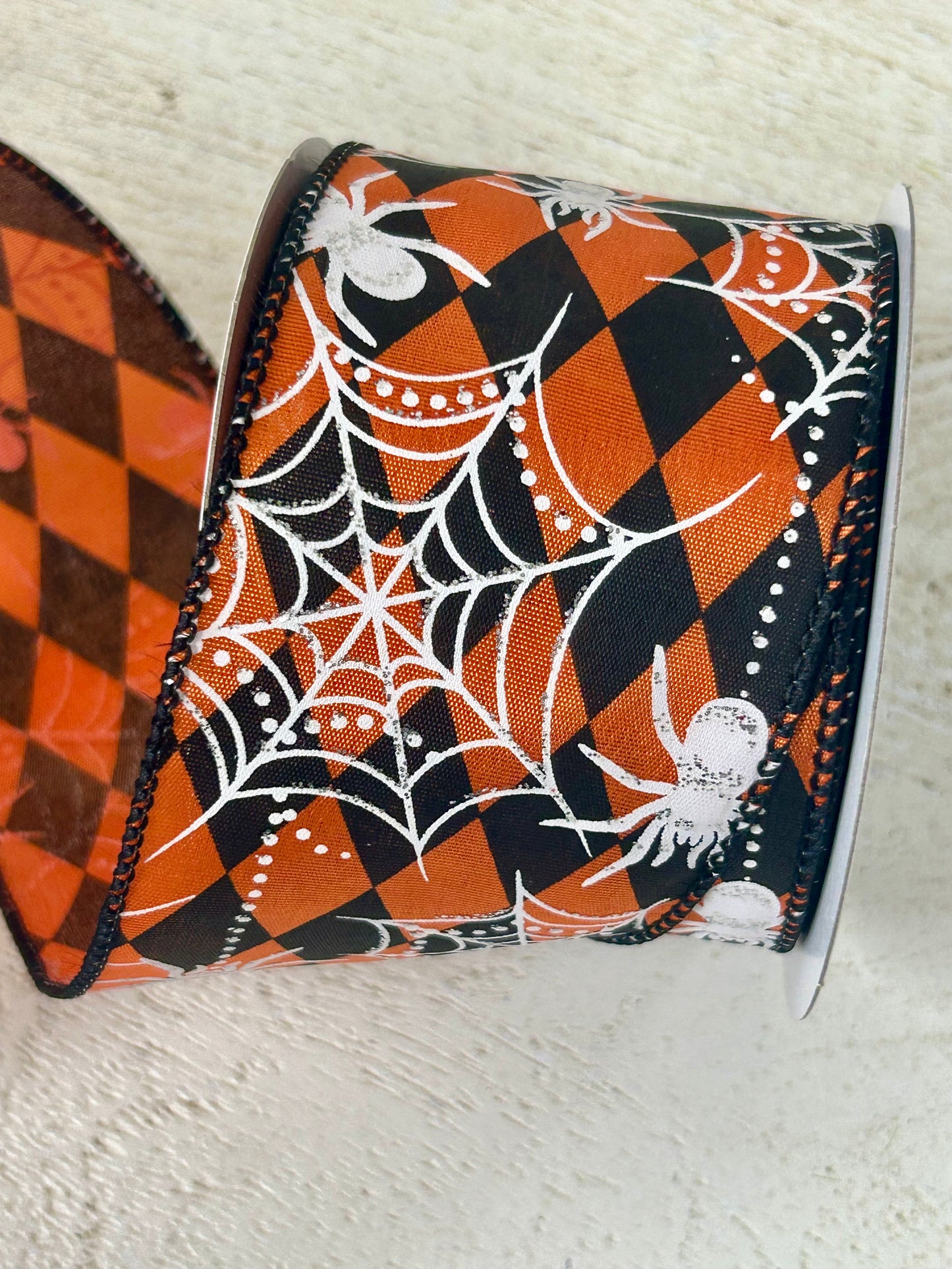 2.5 Inch By 10 Yard Black And Orange Harlequin With Spider Web Ribbon