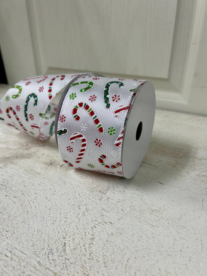 2.5 Inch By 10 Yard Multicolored Candy Canes With Multicolored Snowflakes On A White Textured Background Ribbon