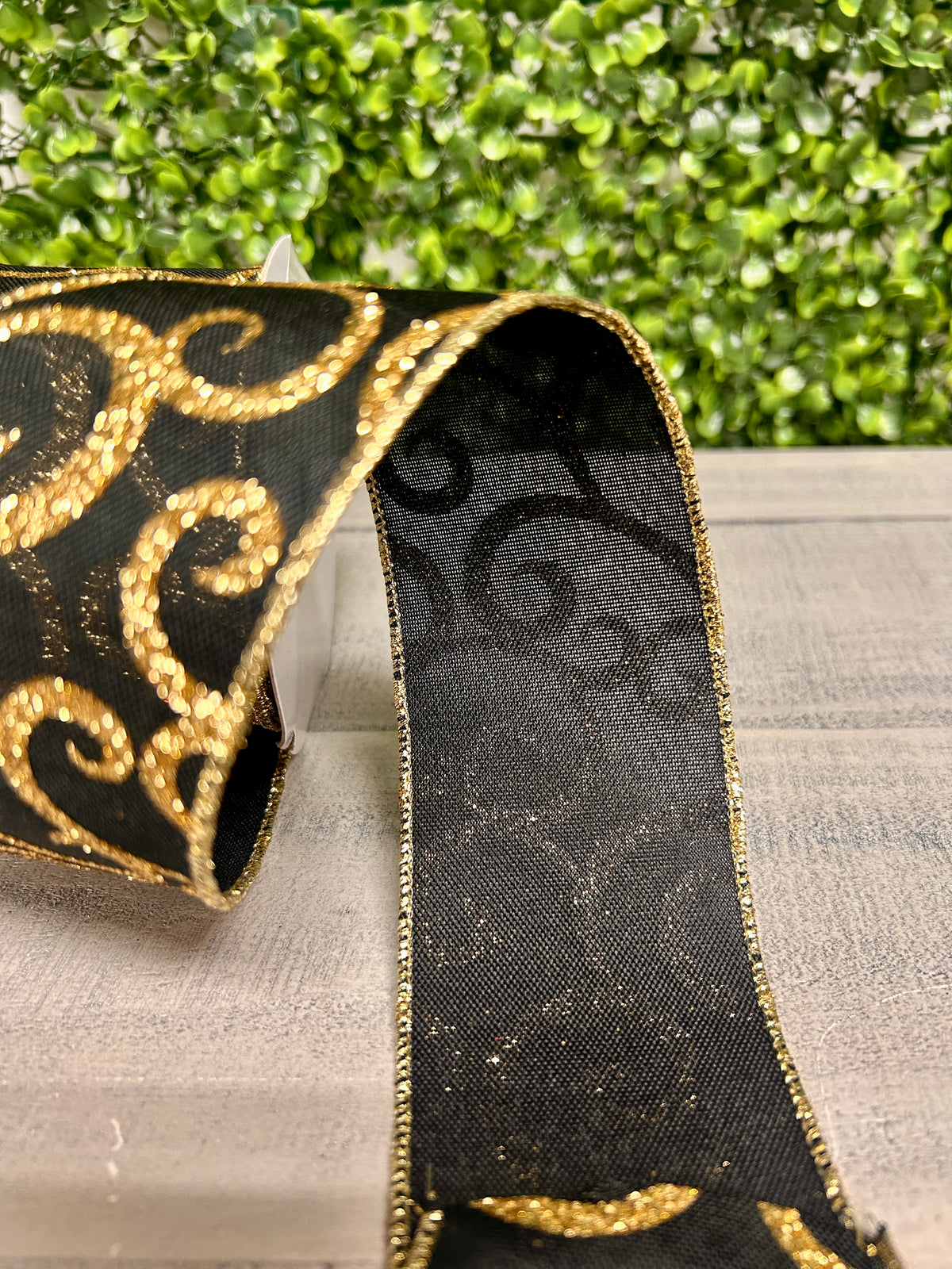 2.5 Inch By 10 Yard Black And Gold Glitter Swirl Ribbon