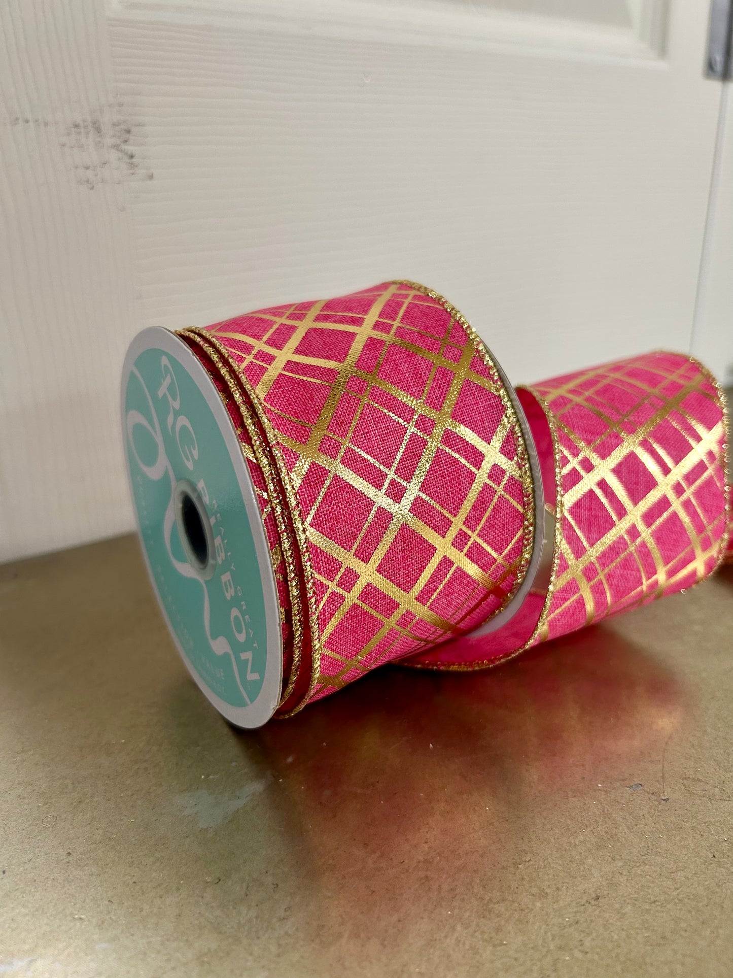 2.5 Inch By 10 Yard Hot Pink And Gold Metallic Thick And Thin Diagonal Plaid Ribbon