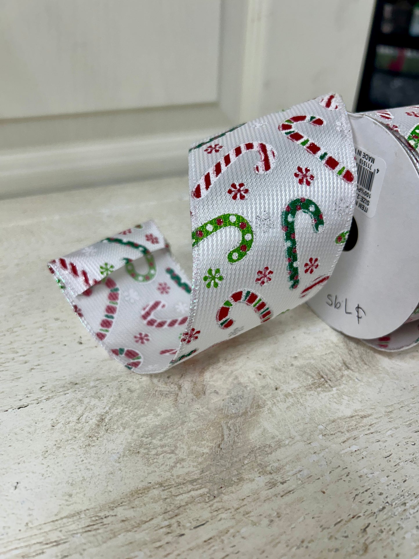 2.5 Inch By 10 Yard Multicolored Candy Canes With Multicolored Snowflakes On A White Textured Background Ribbon
