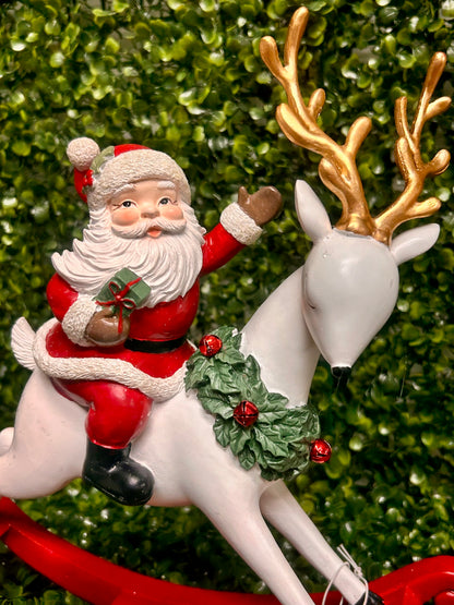 11.75 Inch Resin Santa On Rocking Deer