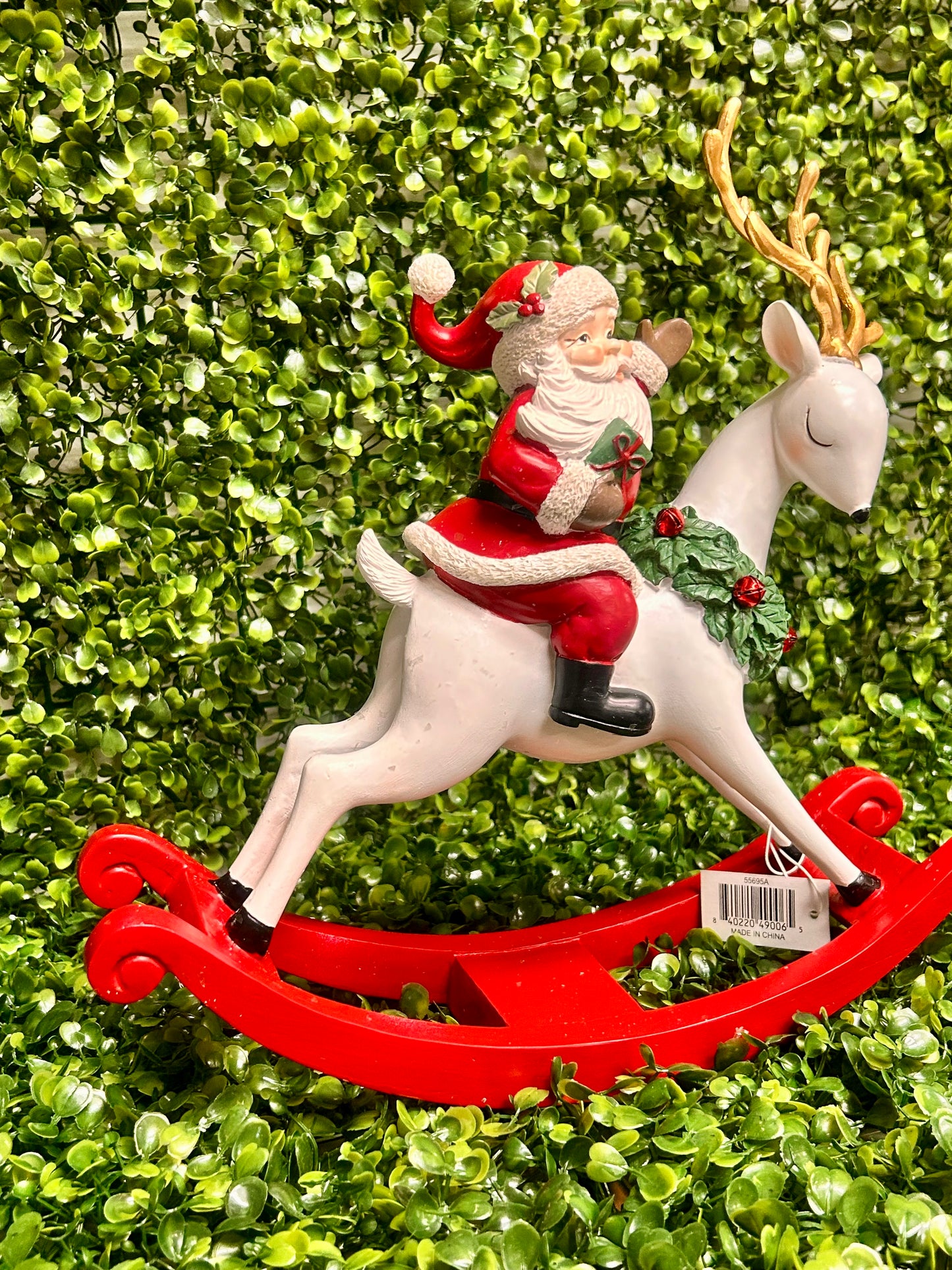 11.75 Inch Resin Santa On Rocking Deer