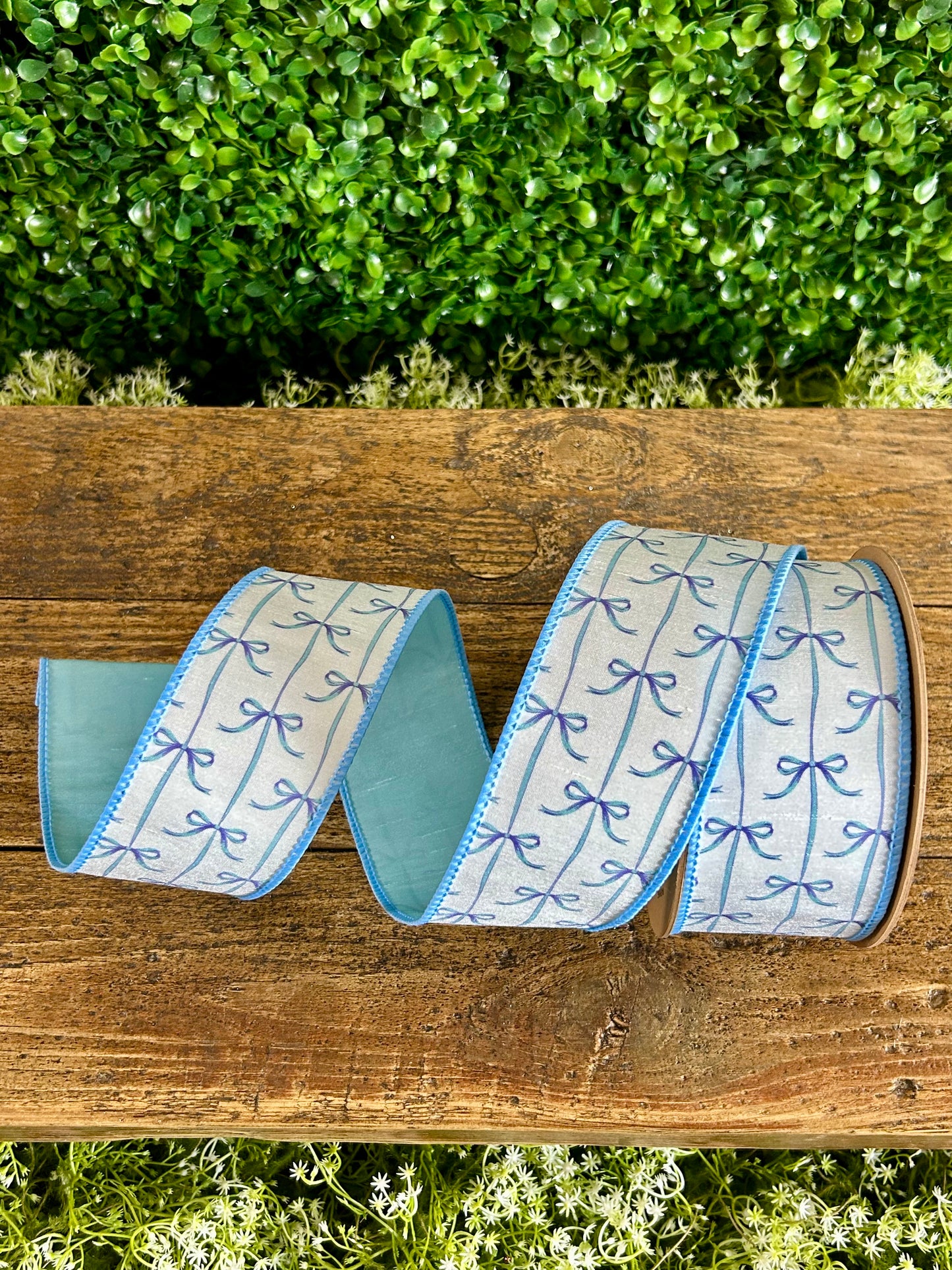 2.5 Inch By 10 Yard Blue Bows On White Dupioni Ribbon