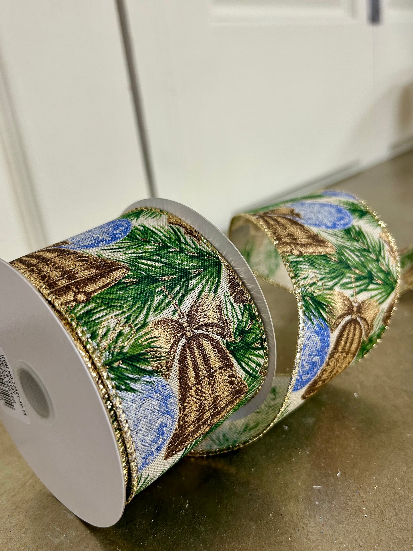 2.5 Inch By 10 Yard Gold Burnished Bells And Dusty Blue Ornaments On Natural Linen Ribbon