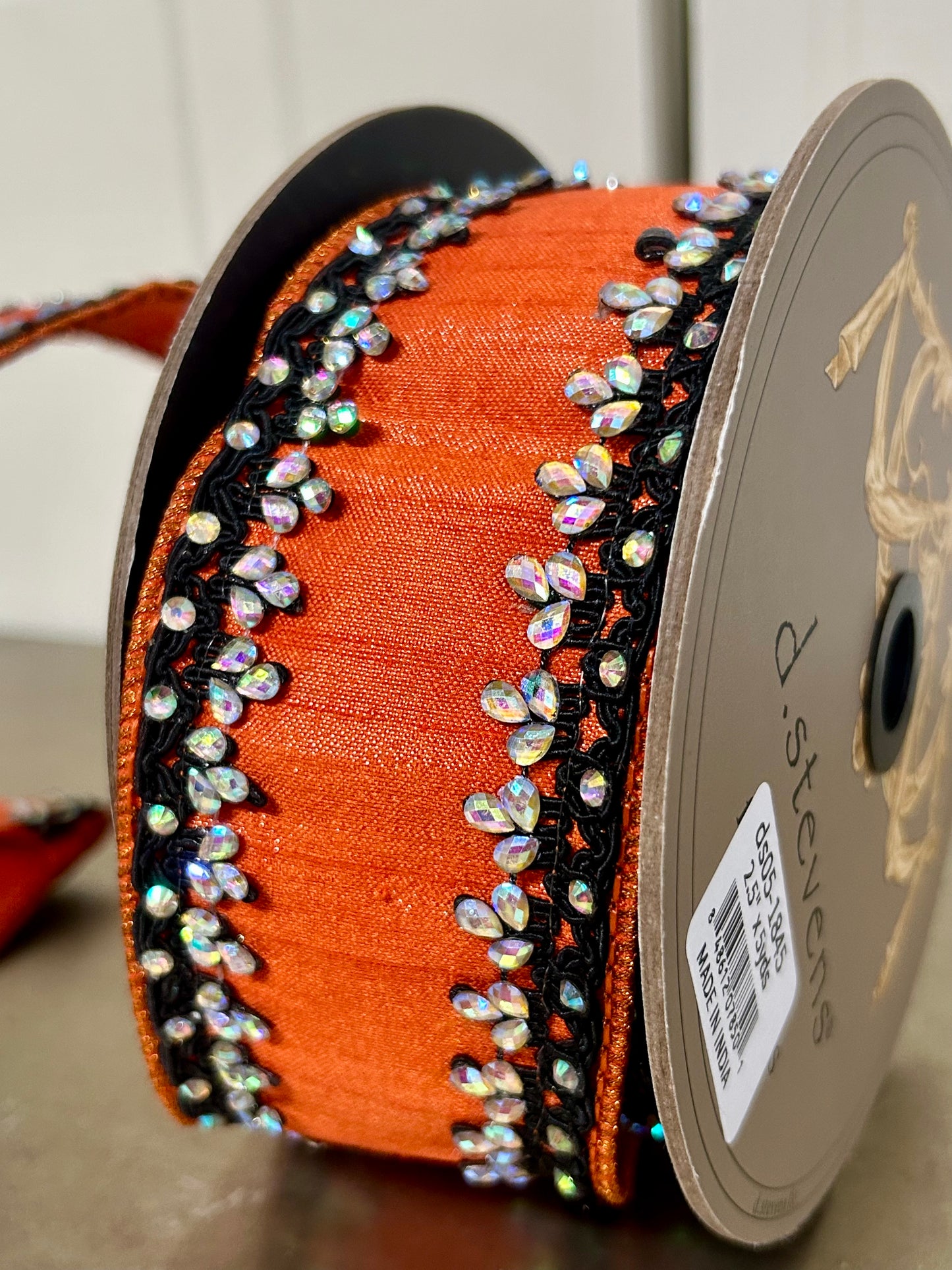 2.5 Inch By 5 Yards Orange And Black Metallic Dupioni With Iris Jewel Trim Ribbon