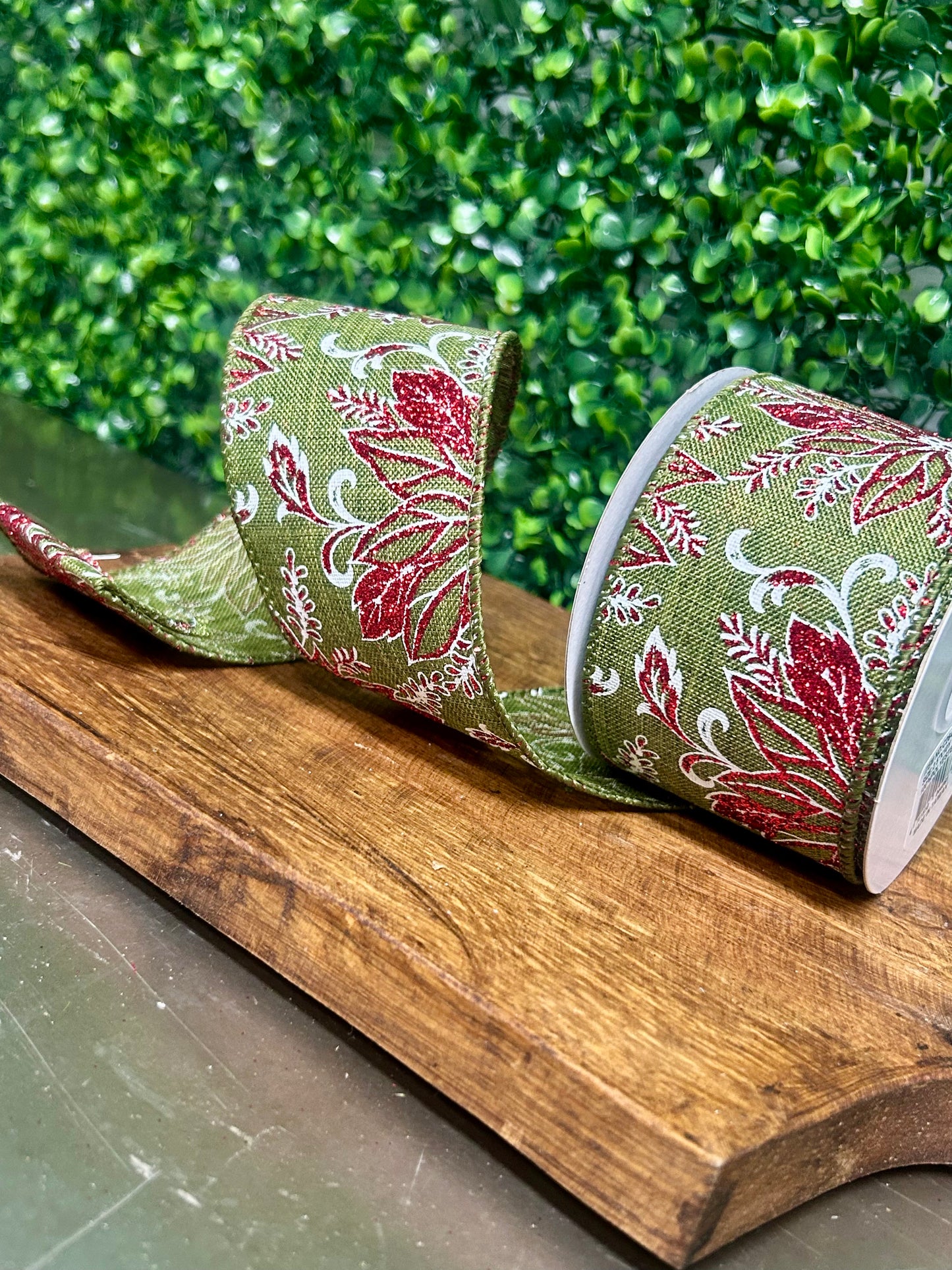 2.5 Inch By 10 Yard Red Glitter Leaf On Moss Green Ribbon