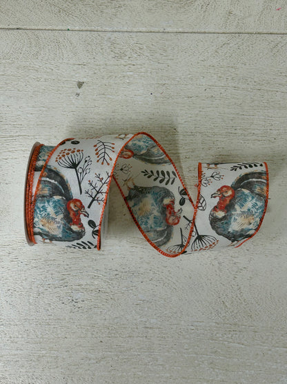 2.5 Inch By 10 Yard Blue And Orange Turkey With Orange Berry Sprays With A White Background And Orange Edging Ribbon