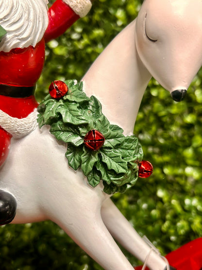 11.75 Inch Resin Santa On Rocking Deer