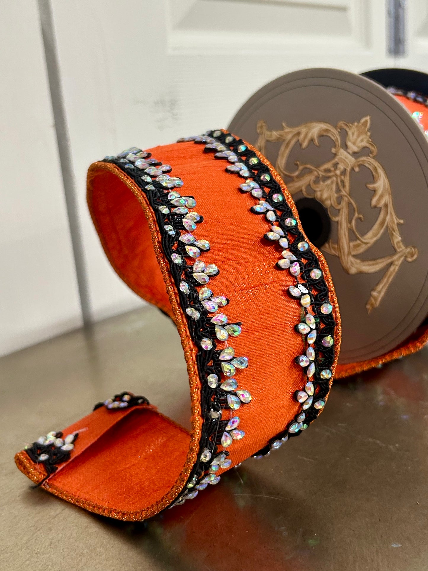 2.5 Inch By 5 Yards Orange And Black Metallic Dupioni With Iris Jewel Trim Ribbon