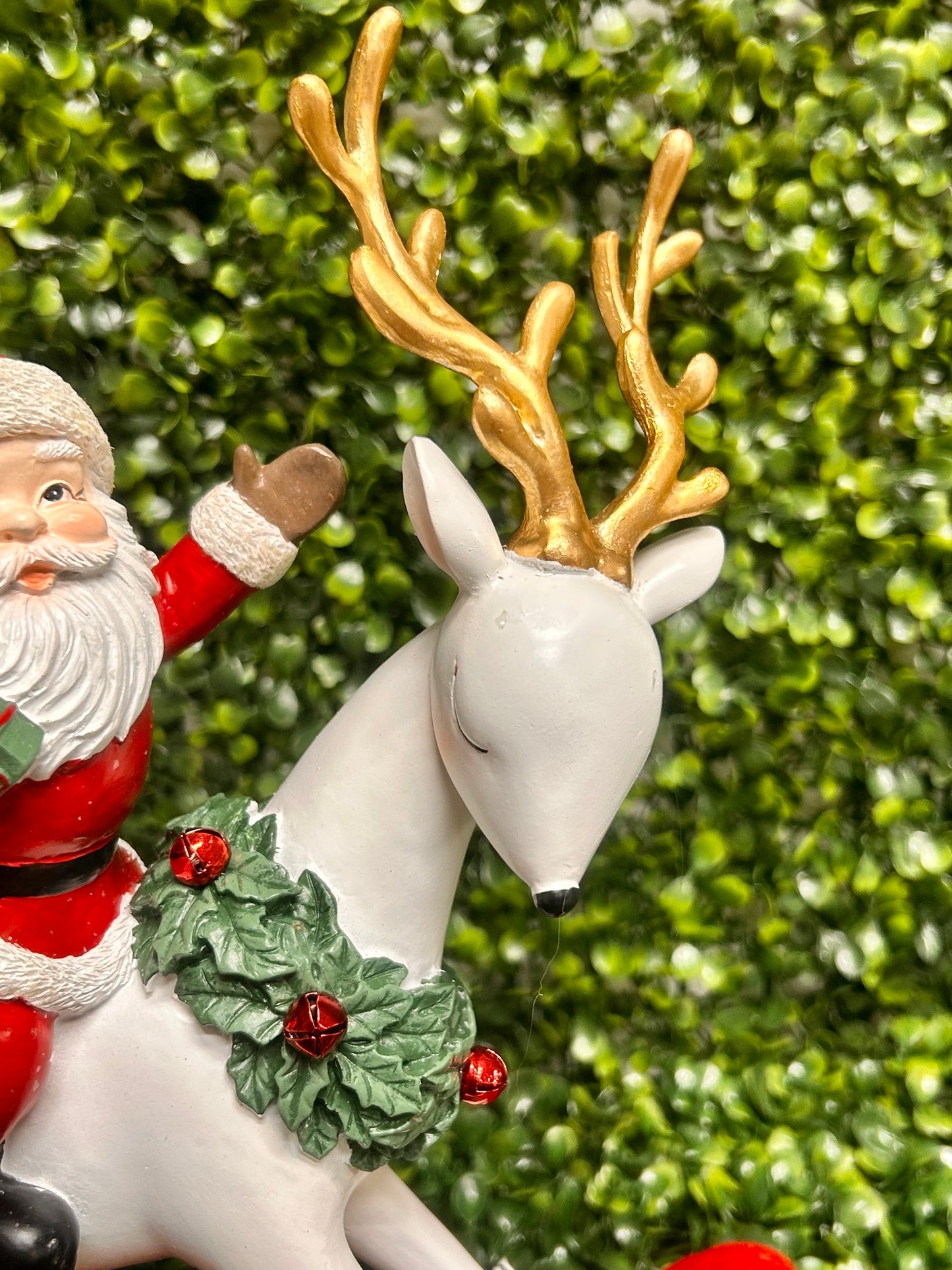 11.75 Inch Resin Santa On Rocking Deer