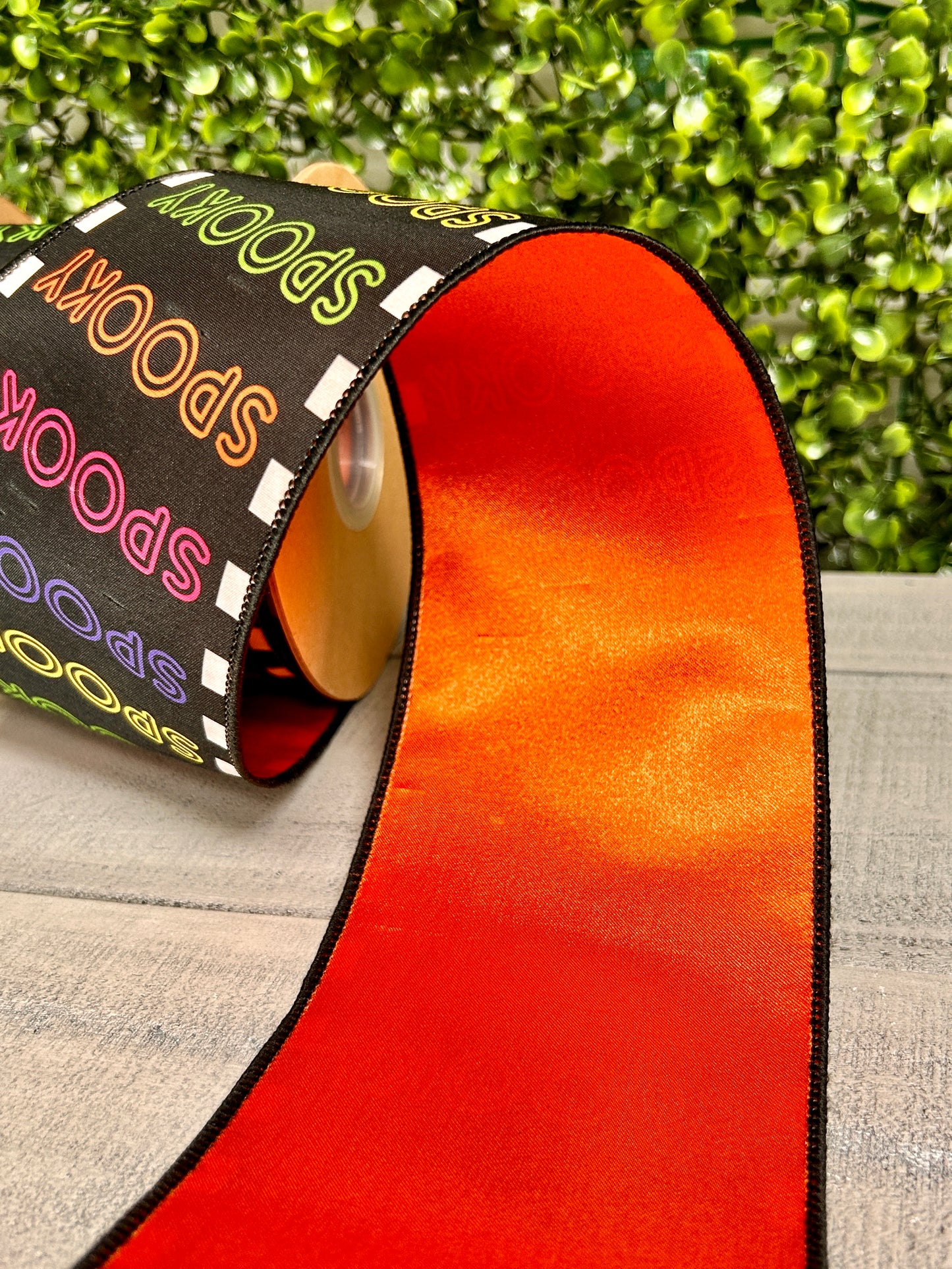 4 Inch By 10 Yard Bright Spooky On Black With Satin Orange Backing Ribbon