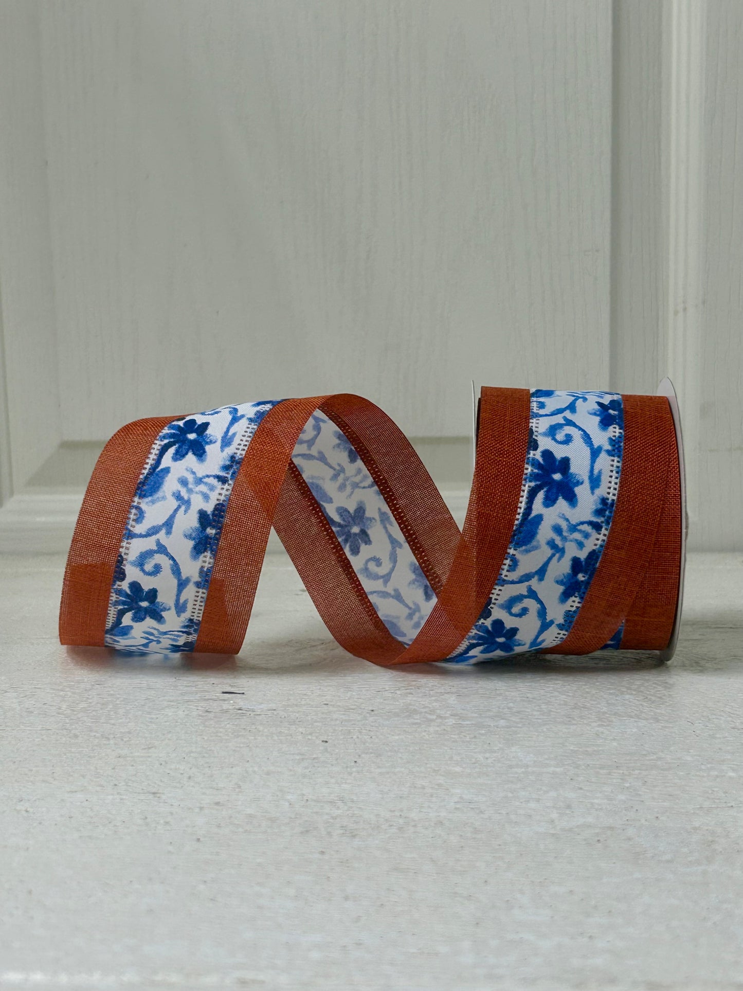 2.5 Inch By 10 Yard Rust Burlap Background With Blue Watercolor Flowers Middle Ribbon