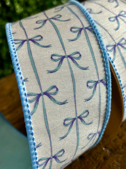 2.5 Inch By 10 Yard Blue Bows On White Dupioni Ribbon