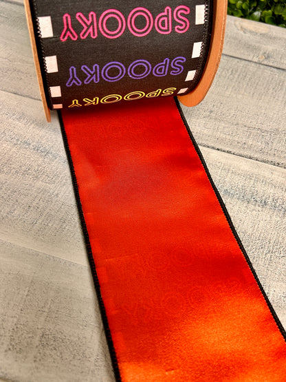 4 Inch By 10 Yard Bright Spooky On Black With Satin Orange Backing Ribbon