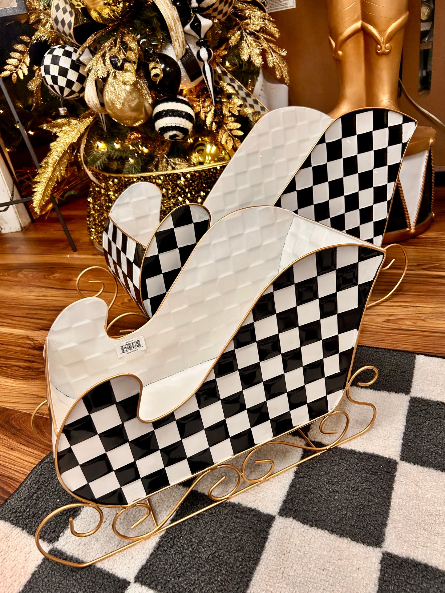 Set Of Two Black And White Checker Metal Sleighs