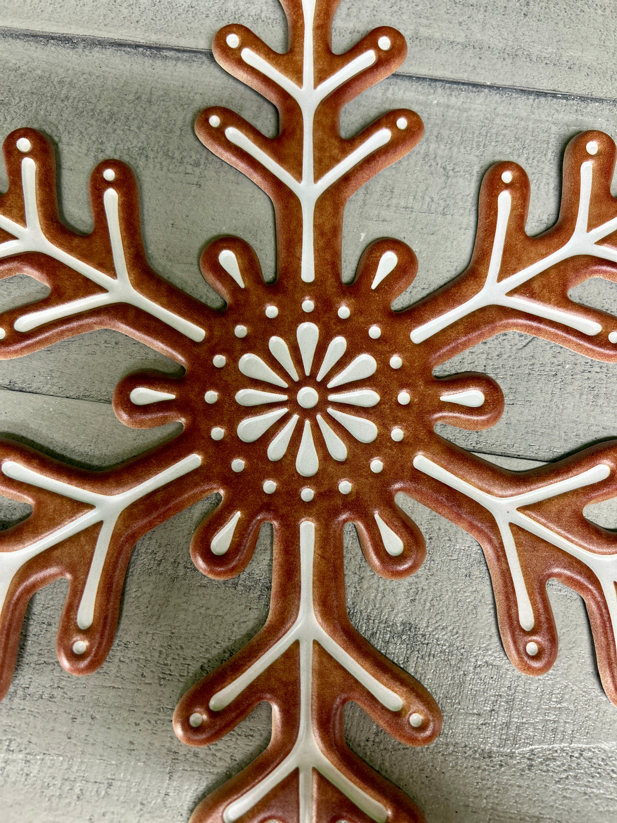 12 Inch Brown And White Metal Embossed Snowflake Sign