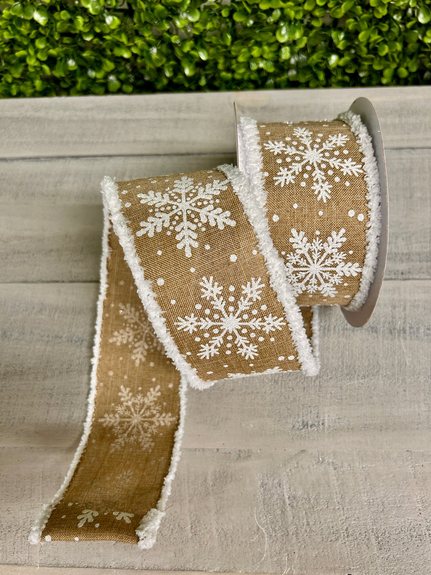 2.5 Inch By 10 Yard White Glittered Snowflakes On Light Beige Background With Snowdrift Edging Ribbon