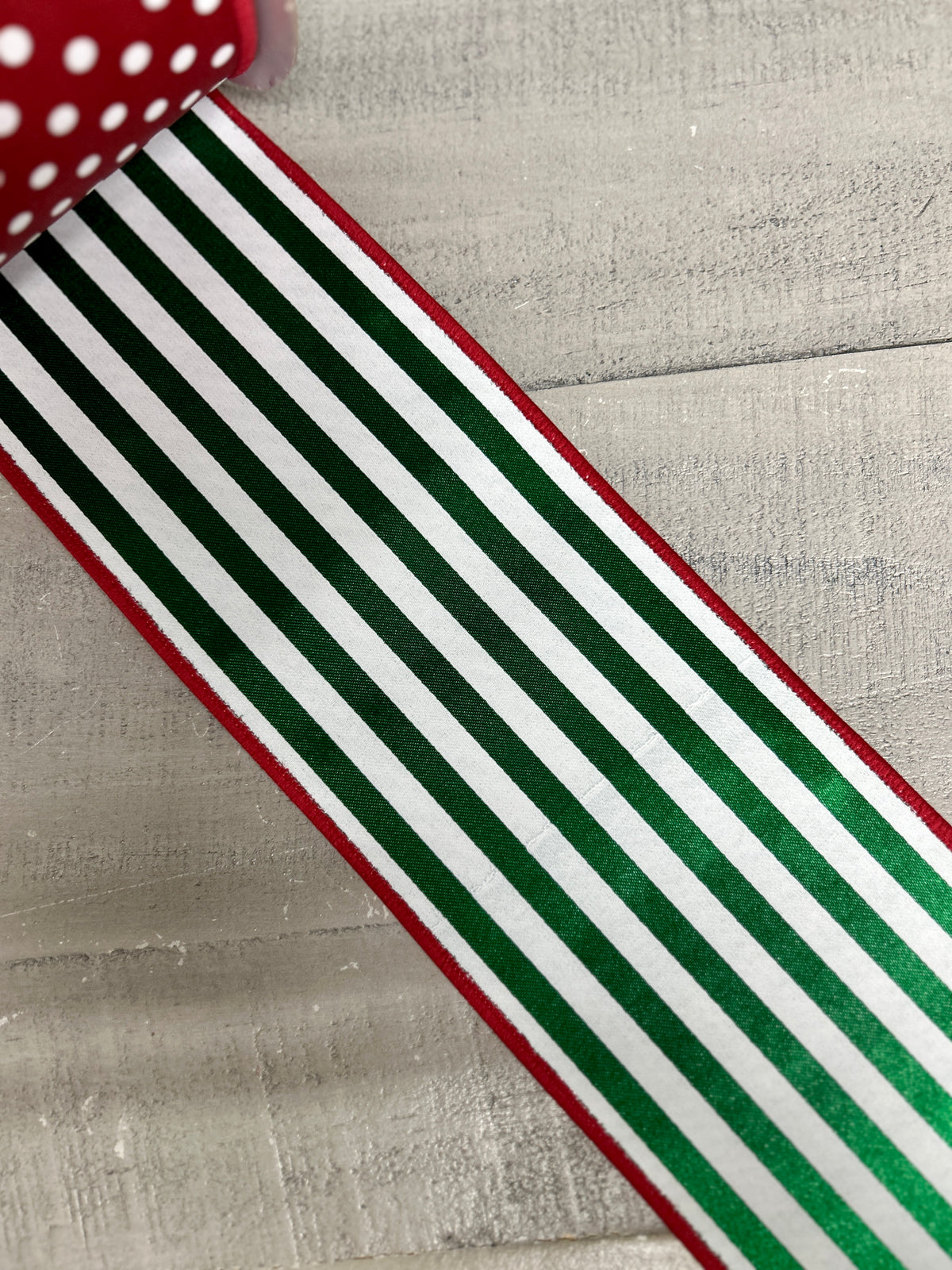 4 Inch By 10 Yard Red And White Polka Dot With Emerald And White Stripe Backing Fused Ribbon