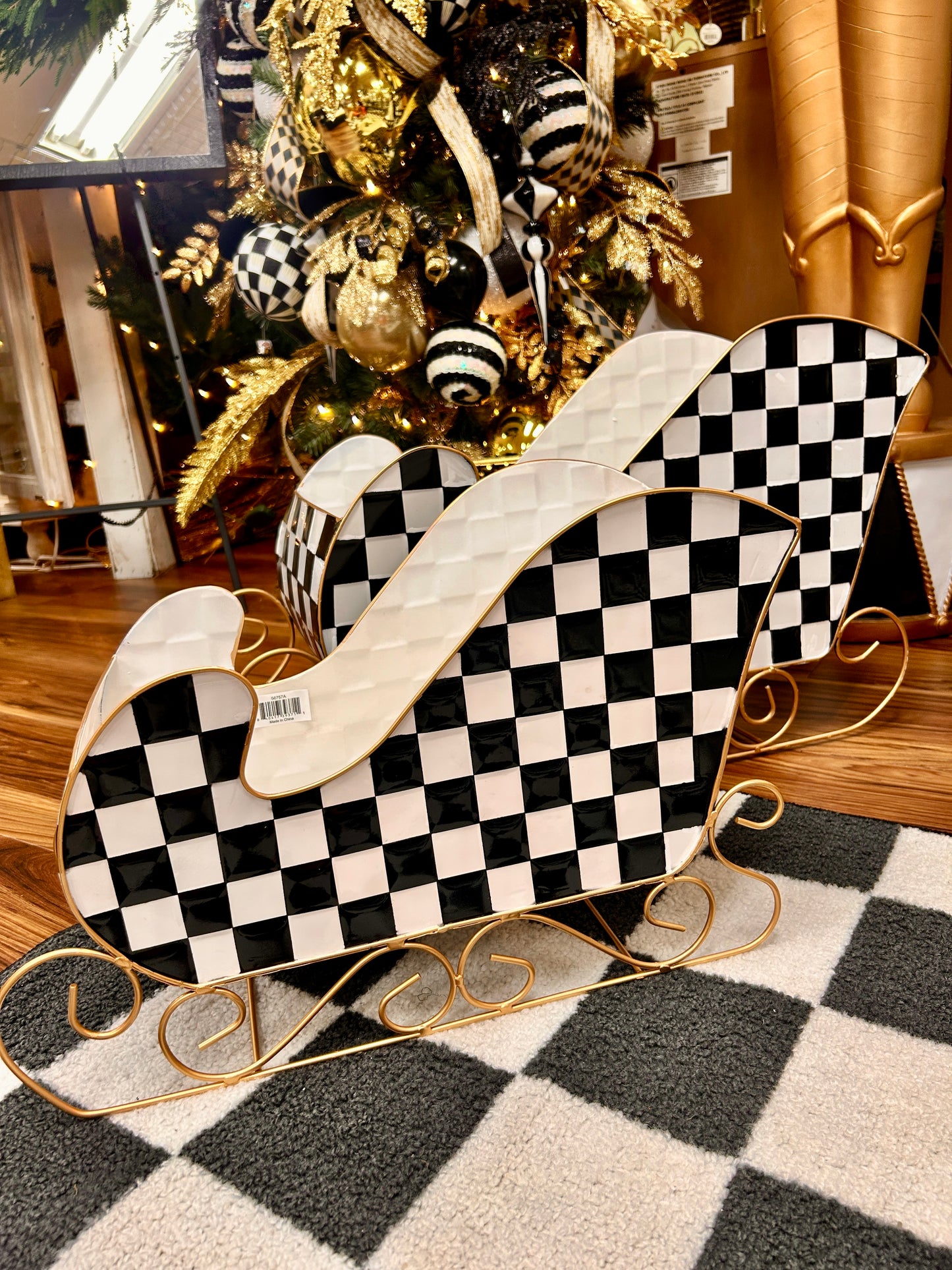 Set Of Two Black And White Checker Metal Sleighs