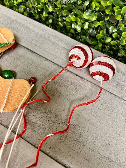 25 Inch Brown Emerald And Red Gingerbread Man With Candy Spray