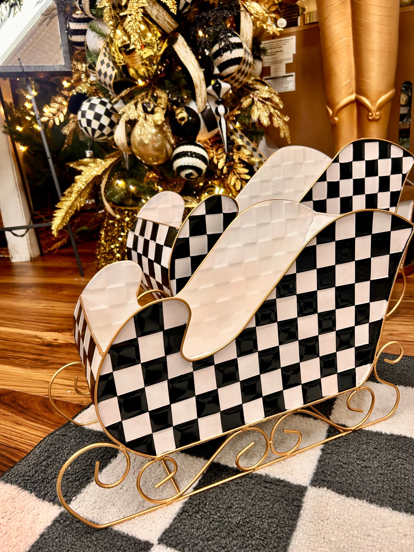 Set Of Two Black And White Checker Metal Sleighs