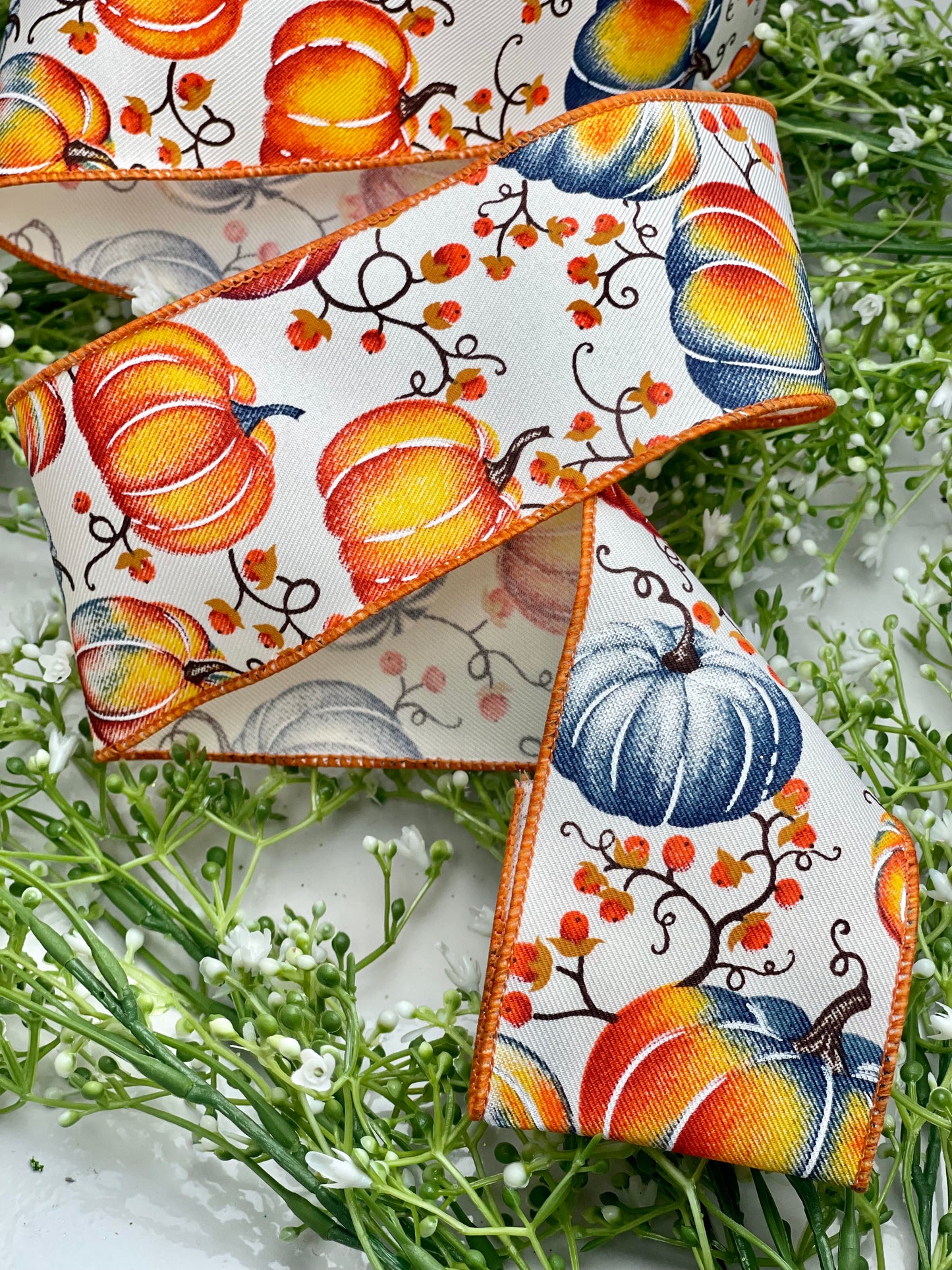 2.5 Inch Ivory With Orange And Blue Pumpkins Ribbon